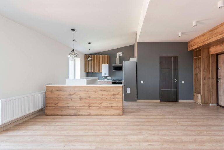 empty kitchen with brown finishing. Move in move out cleaning in Moose Jaw. Move-in / move-out cleaning in brooklyn